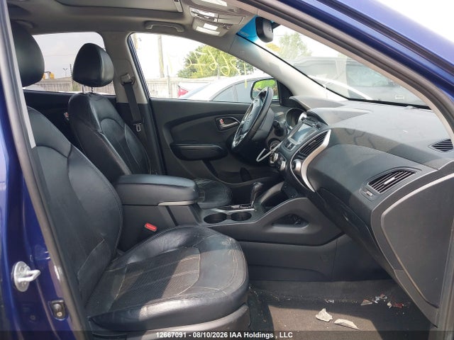 12667091 :رقم المزاد ، KM8JUCAC5CU350493 vin ، 2012 Hyundai Tucson Limited مزاد بيع