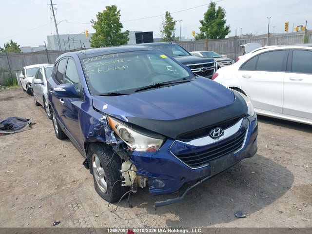 12667091 :رقم المزاد ، KM8JUCAC5CU350493 vin ، 2012 Hyundai Tucson Limited مزاد بيع