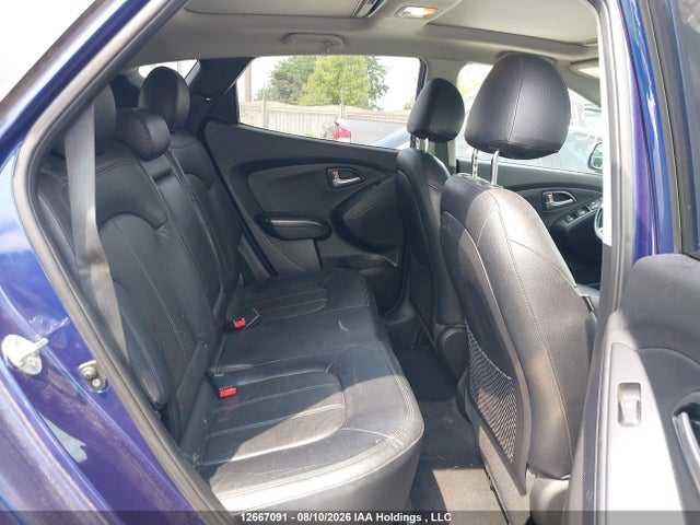 12667091 :رقم المزاد ، KM8JUCAC5CU350493 vin ، 2012 Hyundai Tucson Limited مزاد بيع