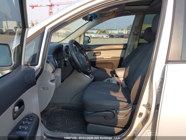 12667102 :رقم المزاد ، KNAFG526877091649 vin ، 2007 Kia Rondo Lx/ex مزاد بيع