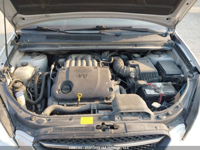 12667102 :رقم المزاد ، KNAFG526877091649 vin ، 2007 Kia Rondo Lx/ex مزاد بيع