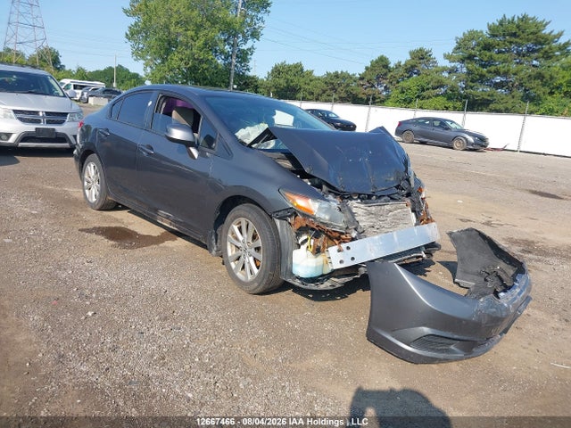 12667466 :رقم المزاد ، 2HGFB2F5XCH010734 vin ، 2012 Honda Civic Lx مزاد بيع