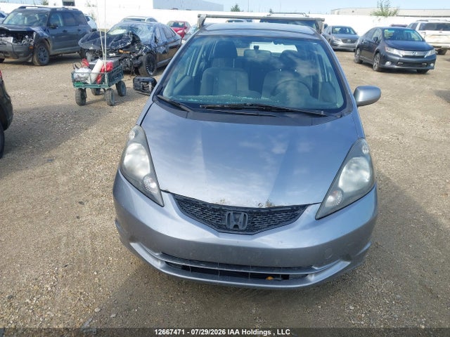 12667471 :رقم المزاد ، JHMGE8H5XAC801225 vin ، 2010 Honda Fit Lx مزاد بيع