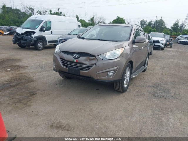 2013 Hyundai Tucson Gls/limited მანქანა იყიდება აუქციონზე, vin: KM8JUCAC6DU715720, აუქციონის ნომერი: 12667539
