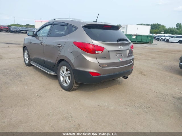 2013 Hyundai Tucson Gls/limited მანქანა იყიდება აუქციონზე, vin: KM8JUCAC6DU715720, აუქციონის ნომერი: 12667539