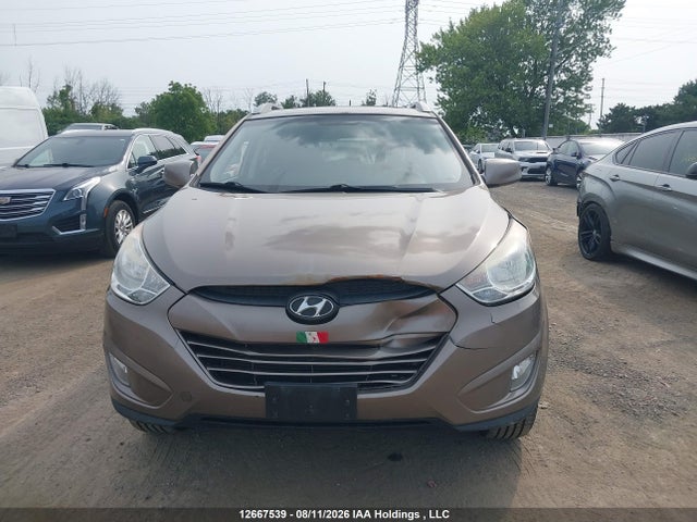 2013 Hyundai Tucson Gls/limited მანქანა იყიდება აუქციონზე, vin: KM8JUCAC6DU715720, აუქციონის ნომერი: 12667539