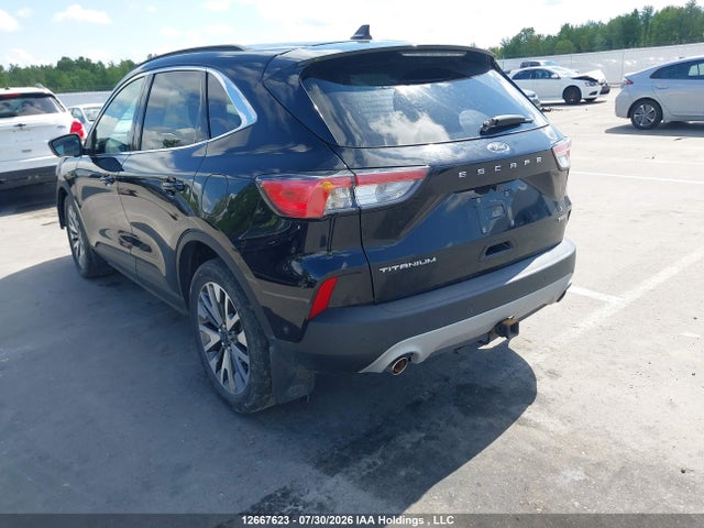 12667623 :رقم المزاد ، 1FMCU9DZ8MUA88126 vin ، 2021 Ford Escape Titanium Hybrid مزاد بيع