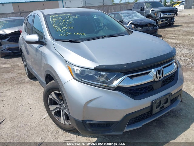 12667802 :رقم المزاد ، 2HKRW2H25JH128147 vin ، 2018 Honda Cr-v Lx مزاد بيع