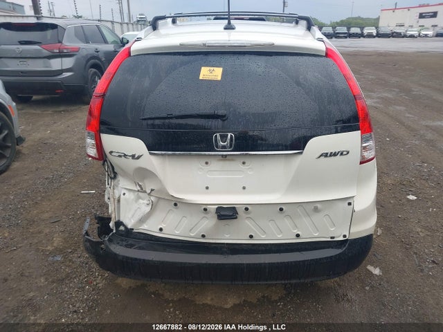 2014 Honda Cr-v Touring მანქანა იყიდება აუქციონზე, vin: 2HKRM4H98EH108074, აუქციონის ნომერი: 12667882
