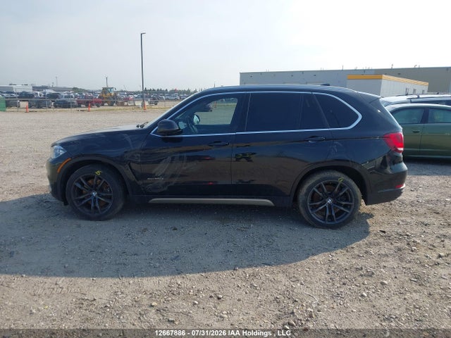 BMW X5 50i 2014 5UXKR6C59E0C03471 Image 11