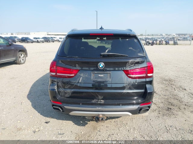 BMW X5 50i 2014 5UXKR6C59E0C03471 Image 13