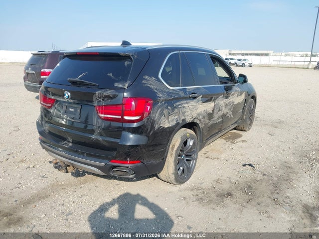 BMW X5 50i 2014 5UXKR6C59E0C03471 Image 4