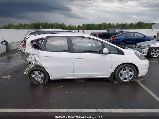 Продаж на аукціоні авто 2013 Honda Fit Lx, vin: LUCGE8H58D3000911, номер лоту: 12668008