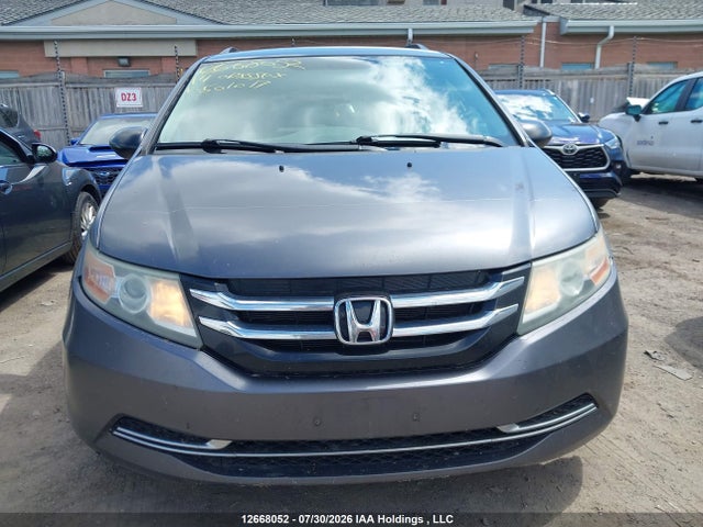 Продажа на аукционе авто 2014 Honda Odyssey Se, vin: 5FNRL5H37EB501017, номер лота: 12668052