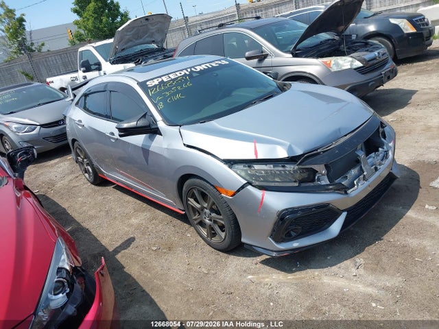 12668054 :رقم المزاد ، SHHFK7H93JU305266 vin ، 2018 Honda Civic Sport Touring مزاد بيع