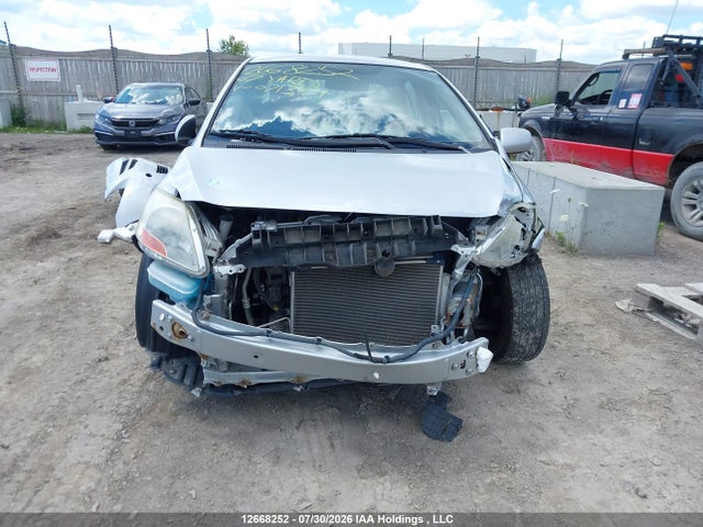 12668252 :رقم المزاد ، JTDBT923671071364 vin ، 2007 Toyota Yaris مزاد بيع