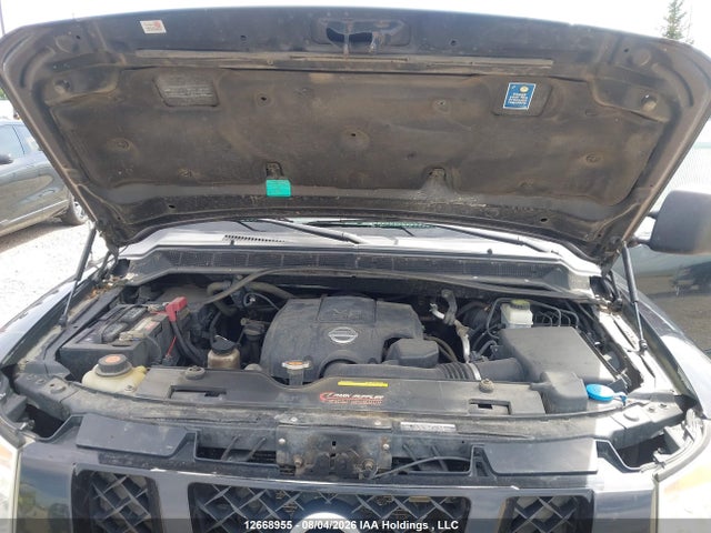 12668955 :رقم المزاد ، 1N6AA0EC0CN306284 vin ، 2012 Nissan Titan Pro-4x/s/sl/sv مزاد بيع