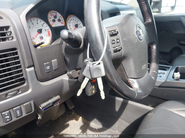 12668955 :رقم المزاد ، 1N6AA0EC0CN306284 vin ، 2012 Nissan Titan Pro-4x/s/sl/sv مزاد بيع