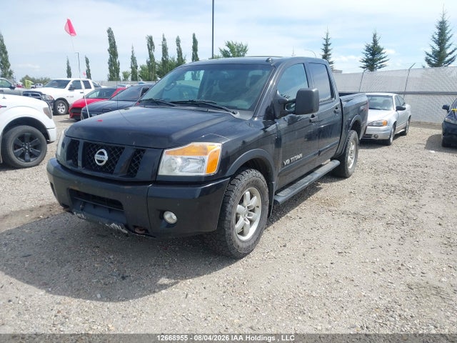 12668955 :رقم المزاد ، 1N6AA0EC0CN306284 vin ، 2012 Nissan Titan Pro-4x/s/sl/sv مزاد بيع