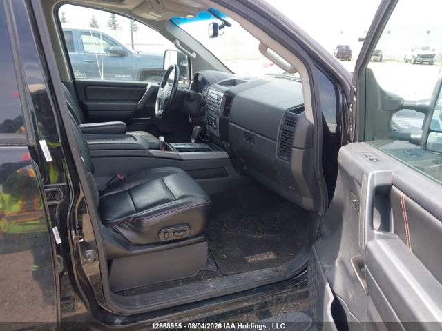 12668955 :رقم المزاد ، 1N6AA0EC0CN306284 vin ، 2012 Nissan Titan Pro-4x/s/sl/sv مزاد بيع