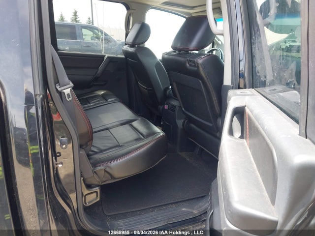 12668955 :رقم المزاد ، 1N6AA0EC0CN306284 vin ، 2012 Nissan Titan Pro-4x/s/sl/sv مزاد بيع