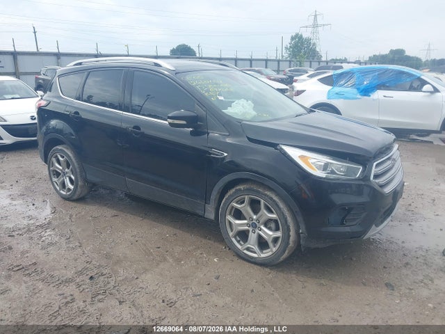 12669064 :رقم المزاد ، 1FMCU9J91HUE99068 vin ، 2017 Ford Escape Titanium مزاد بيع