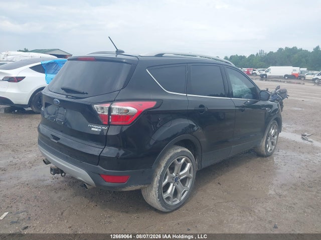Ford Escape Titanium 2017 1FMCU9J91HUE99068 Image 4