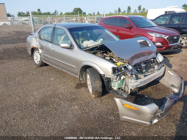 12669600 :رقم المزاد ، JN1CA31D31T817270 vin ، 2001 Nissan Maxima Gxe مزاد بيع