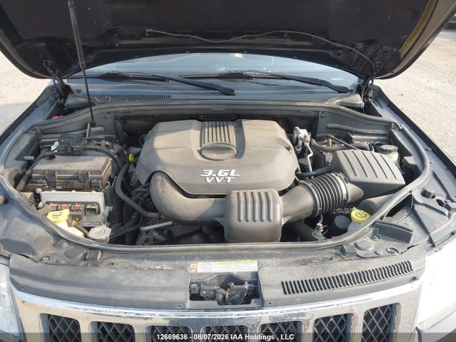 2012 Jeep Grand Cherokee Overland მანქანა იყიდება აუქციონზე, vin: 1C4RJFCG8CC310433, აუქციონის ნომერი: 12669636