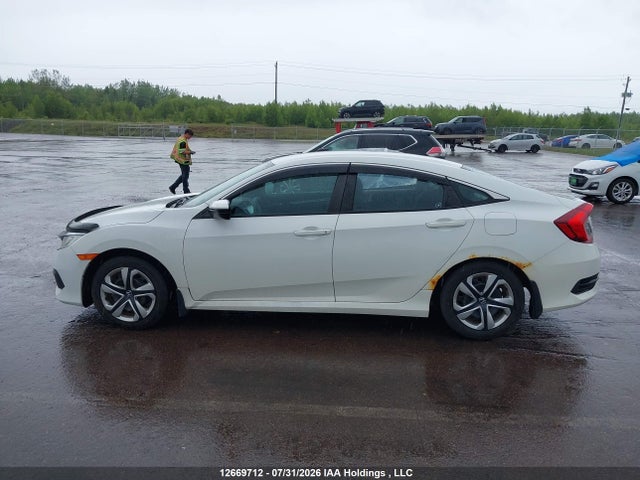 Продажа на аукционе авто 2016 Honda Civic Lx, vin: 2HGFC2E55GH011231, номер лота: 12669712