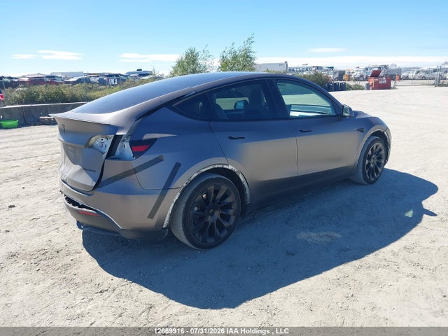 Tesla Model Y 2023 7SAYGAEE1PF644663 Image 4