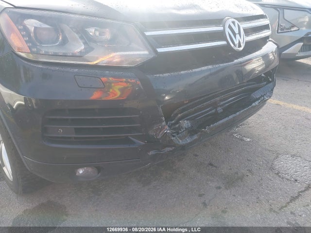 2012 Volkswagen Touareg V6 მანქანა იყიდება აუქციონზე, vin: WVGDF9BP0CD001480, აუქციონის ნომერი: 12669936