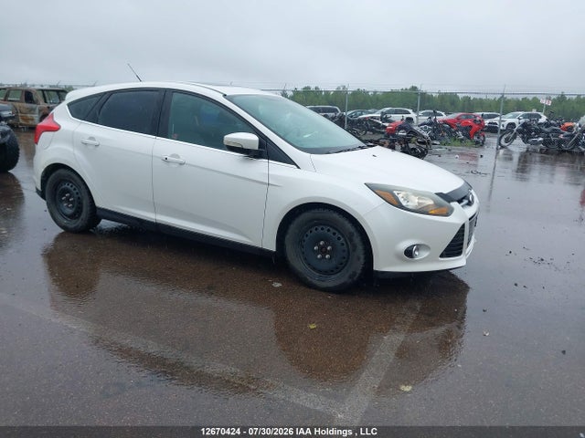 12670424 :رقم المزاد ، 1FADP3N25DL191501 vin ، 2013 Ford Focus Titanium مزاد بيع