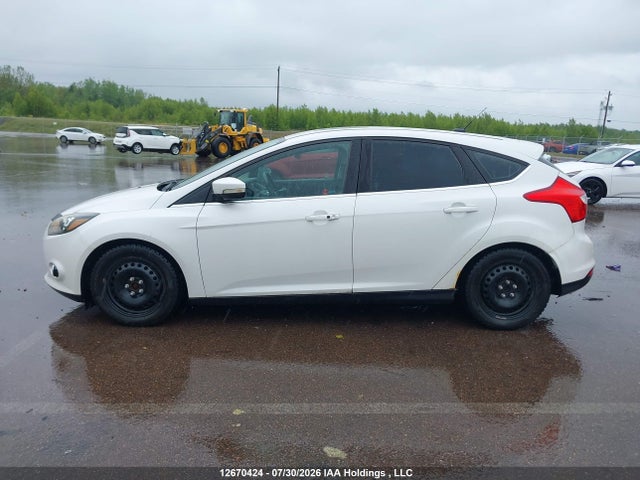 12670424 :رقم المزاد ، 1FADP3N25DL191501 vin ، 2013 Ford Focus Titanium مزاد بيع