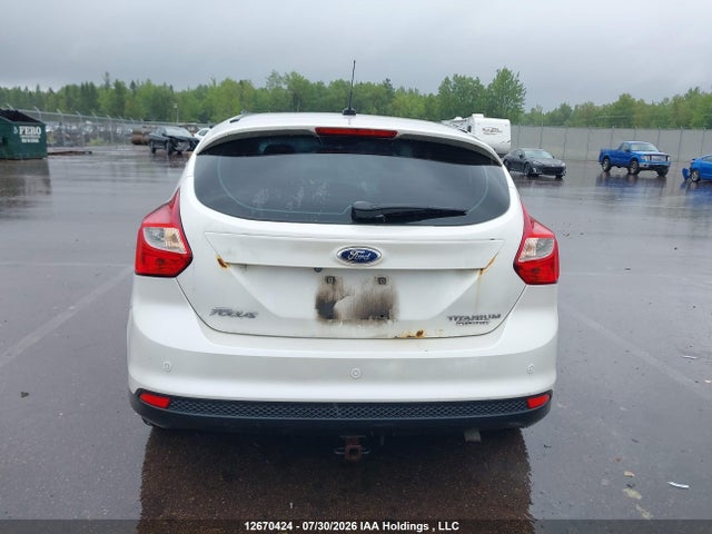 12670424 :رقم المزاد ، 1FADP3N25DL191501 vin ، 2013 Ford Focus Titanium مزاد بيع