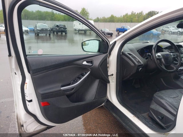 12670424 :رقم المزاد ، 1FADP3N25DL191501 vin ، 2013 Ford Focus Titanium مزاد بيع