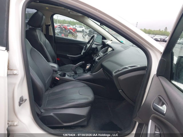 12670424 :رقم المزاد ، 1FADP3N25DL191501 vin ، 2013 Ford Focus Titanium مزاد بيع