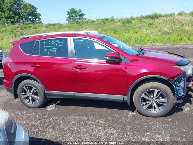 Toyota RAV4 LE 2018 2T3ZFREV2JW504173 Image 14
