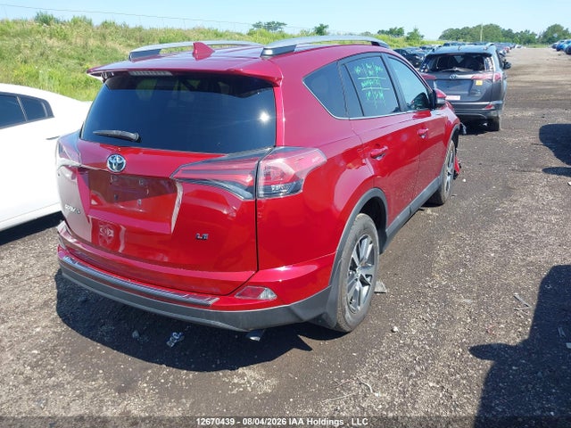 Toyota RAV4 LE 2018 2T3ZFREV2JW504173 Image 4