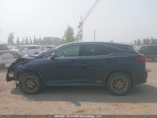 Auction sale of the 2017 Lexus Rx 450h, vin: 2T2BGMCA2HC015998, lot number: 12670452