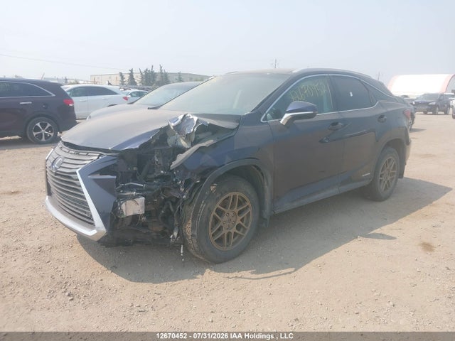 Auction sale of the 2017 Lexus Rx 450h, vin: 2T2BGMCA2HC015998, lot number: 12670452