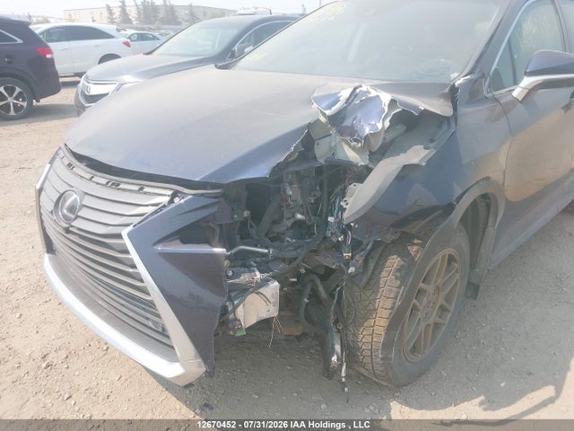 Auction sale of the 2017 Lexus Rx 450h, vin: 2T2BGMCA2HC015998, lot number: 12670452