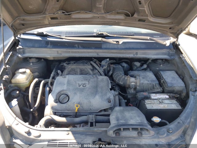 2009 Kia Rondo Lx/ex მანქანა იყიდება აუქციონზე, vin: KNAFG526197270411, აუქციონის ნომერი: 12670625
