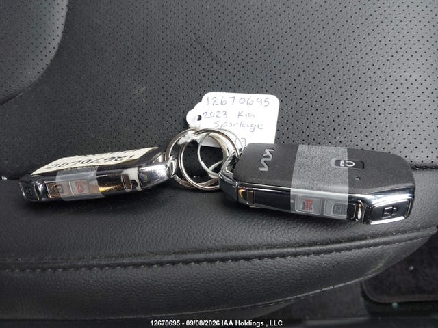 12670695 :رقم المزاد ، KNDPVCAG1P7107265 vin ، 2023 Kia Sportage Ex مزاد بيع
