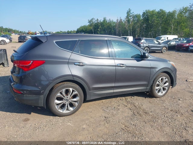 12670736 :رقم المزاد ، 5XYZUDLA8GG319335 vin ، 2016 Hyundai Santa Fe Sport 2.0t Limited مزاد بيع