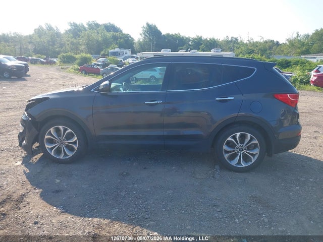 12670736 :رقم المزاد ، 5XYZUDLA8GG319335 vin ، 2016 Hyundai Santa Fe Sport 2.0t Limited مزاد بيع