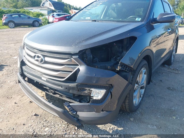12670736 :رقم المزاد ، 5XYZUDLA8GG319335 vin ، 2016 Hyundai Santa Fe Sport 2.0t Limited مزاد بيع