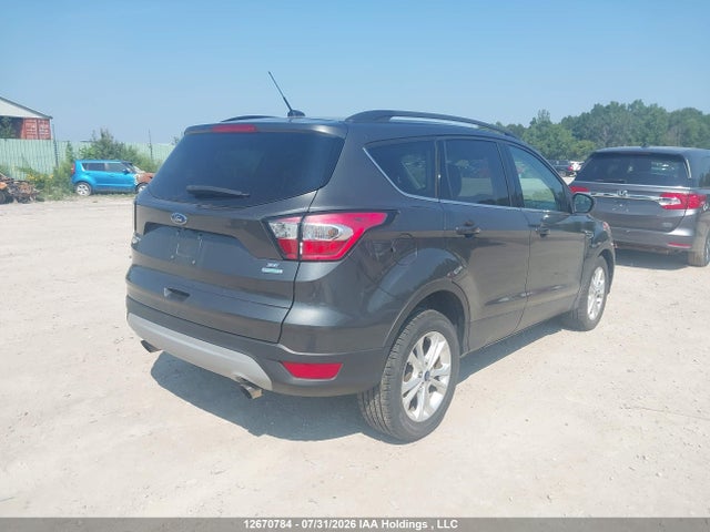 Продаж на аукціоні авто 2018 Ford Escape Se, vin: 1FMCU0GD1JUA06003, номер лоту: 12670784