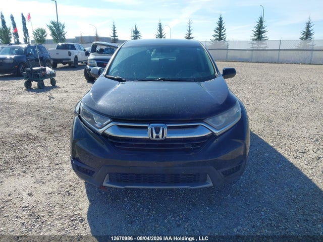 12670986 :رقم المزاد ، 2HKRW1H39HH000409 vin ، 2017 Honda Cr-v Lx مزاد بيع