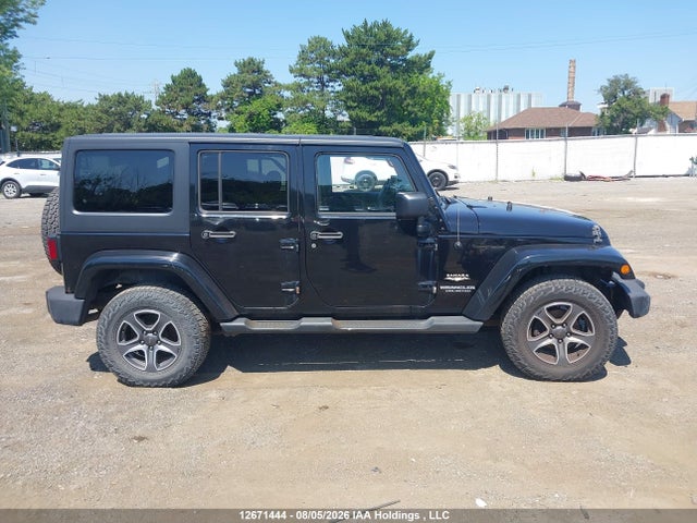 12671444 :رقم المزاد ، 1C4BJWEG9EL289948 vin ، 2014 Jeep Wrangler Unlimited Sahara مزاد بيع